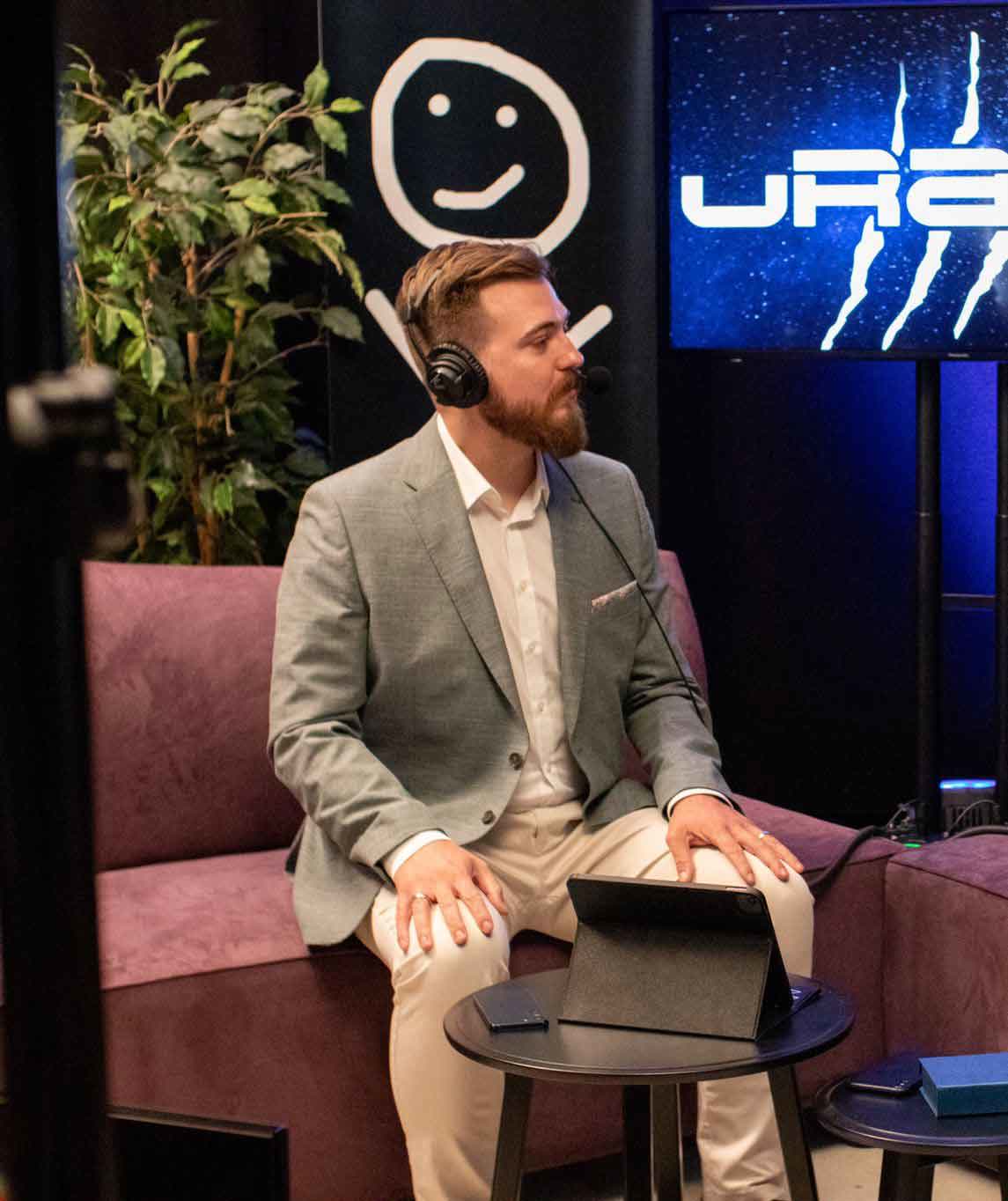 Christian Grollmann als Moderator auf der Bühne